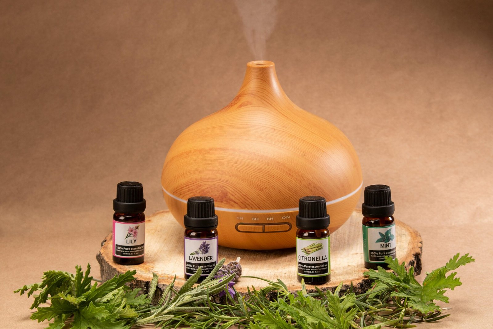 Wooden diffuser with essential oils, perfect for relaxation and aromatherapy needs.
